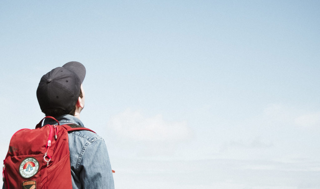 Guy in Cap with Backpack